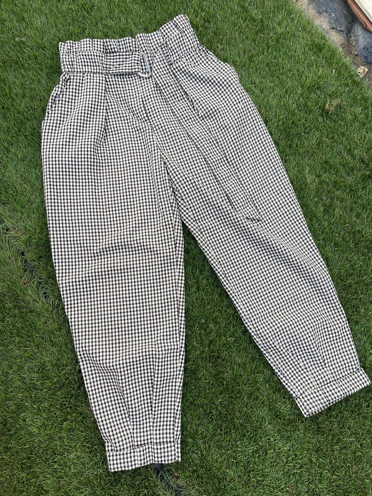 Calça xadres castanho