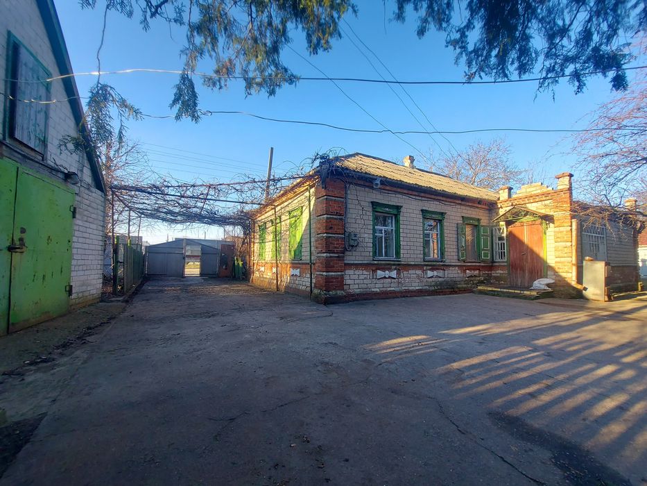 Продам дом с участком под коммерцию в Подгородном