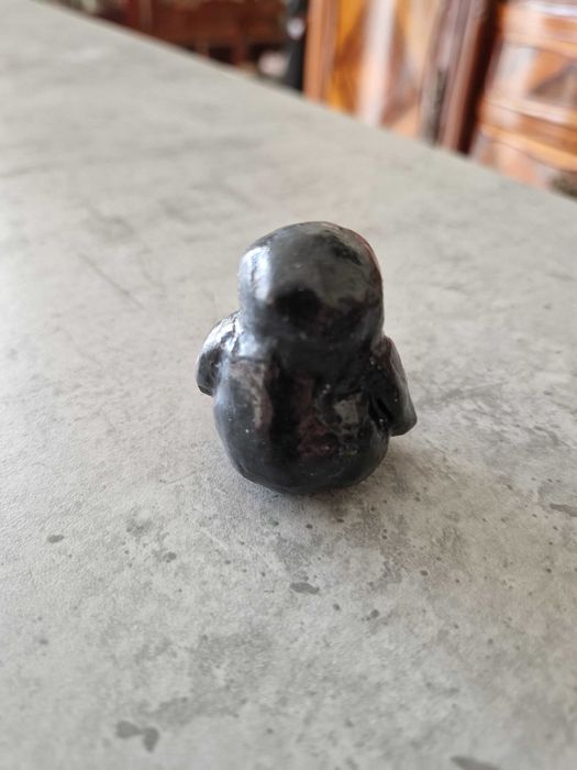 Pinguim feito em argila