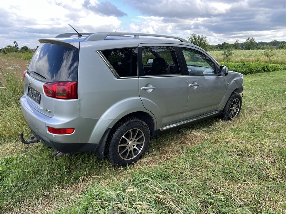 Двері Peugeot 4007 Citroen C-Crosser Mitsubishi Outlander XL