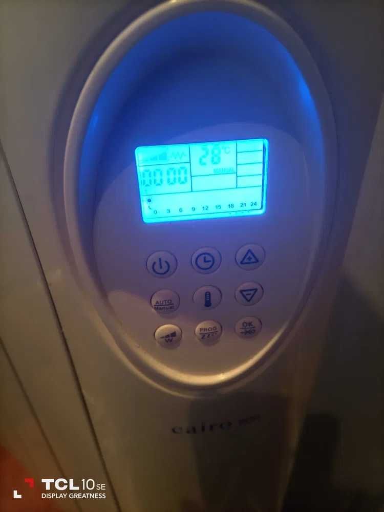 Aquecedor elétrico Taurus com suporte para parede