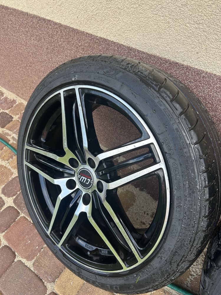 Felgi 18 cali 5x112 z Oponami Dunlop