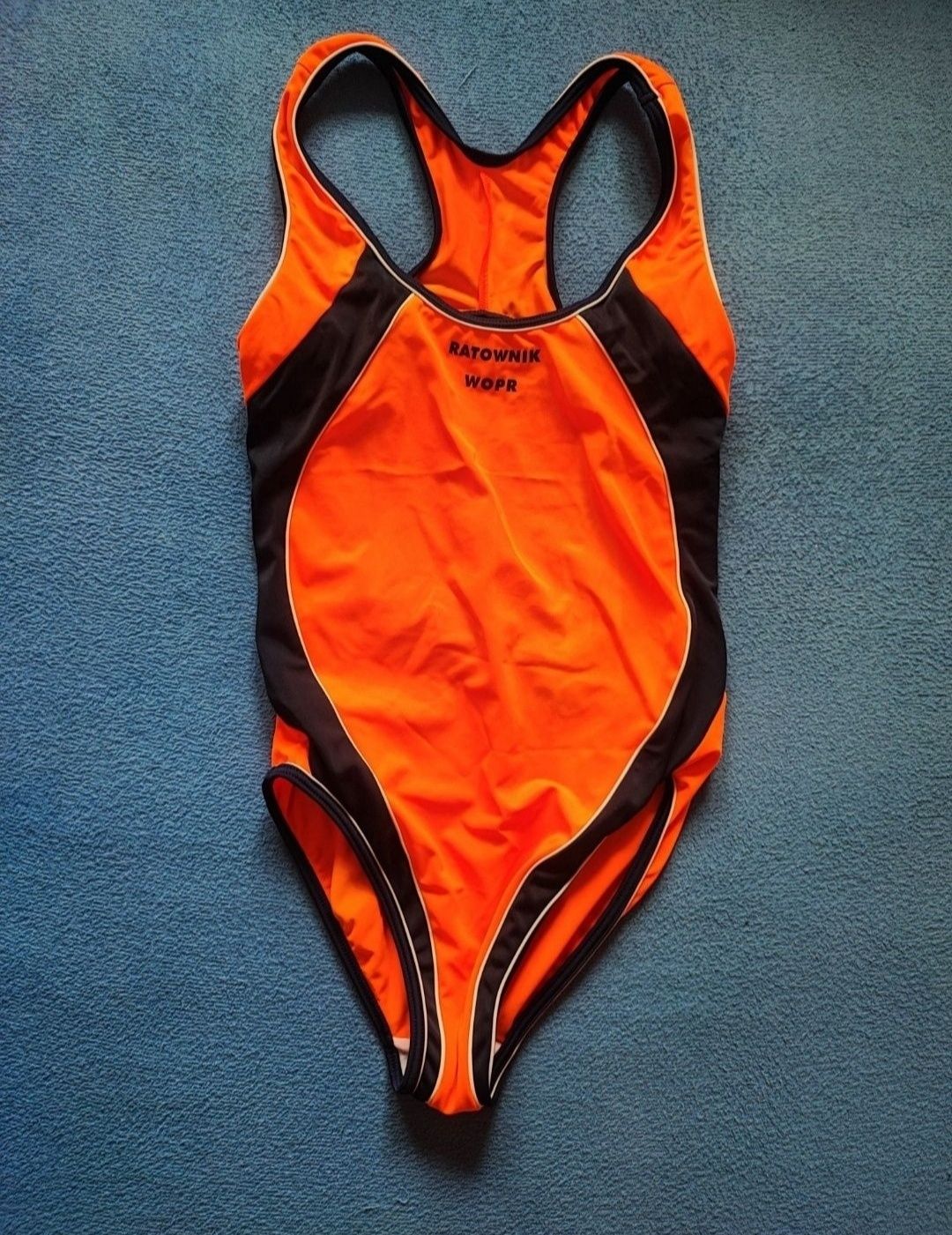 Strój pływacki 1-częściowy pomarańczowy z napisem ratownik wopr nowy