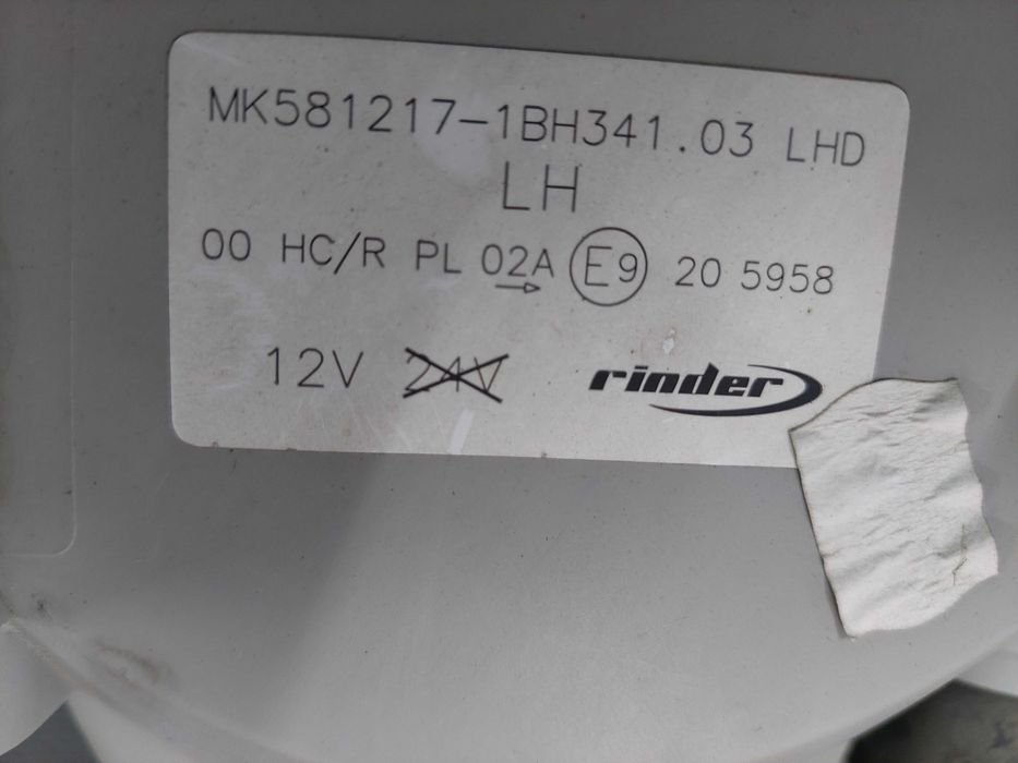 farol esq Mitsubishi