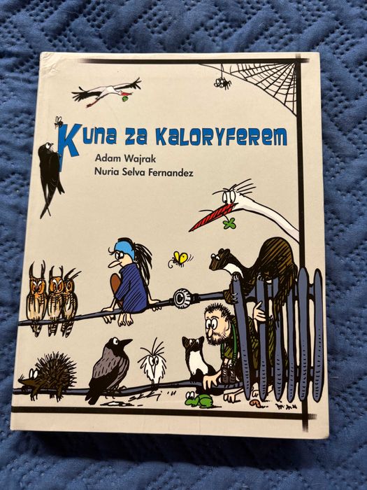 Kuna za kaloryferem A. Wajrak