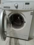 Máquina de lavar roupa LG inverter direct drive 7kg  1000rpm cuba inox