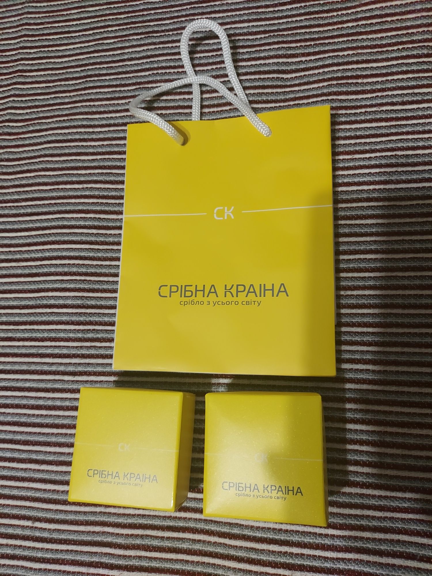 Подарочный пакетик Срібна країна, Кевин Кляйн