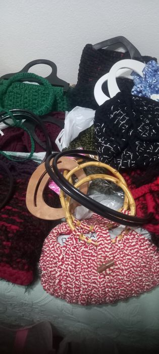 Malas, novelos e alguns acessórios