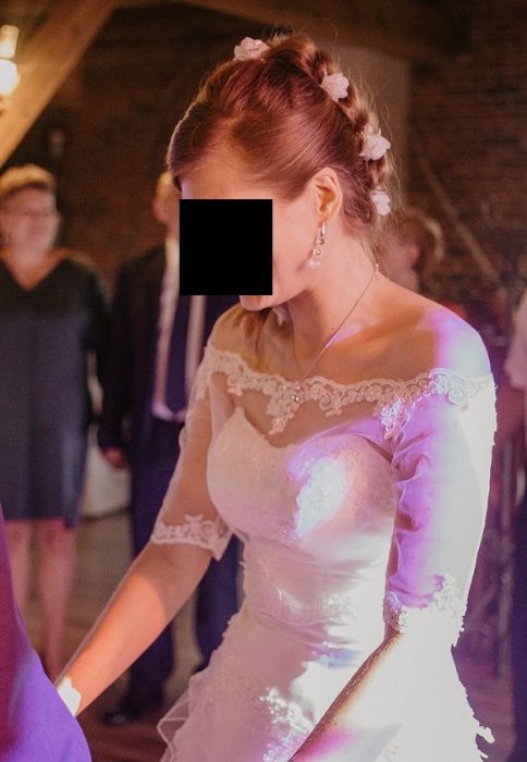 Suknia ślubna śnieżna biel falbany gorset odsłonięta góra