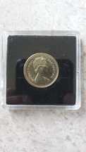 1 libra, Isabel II de 1983, flor de cunho.