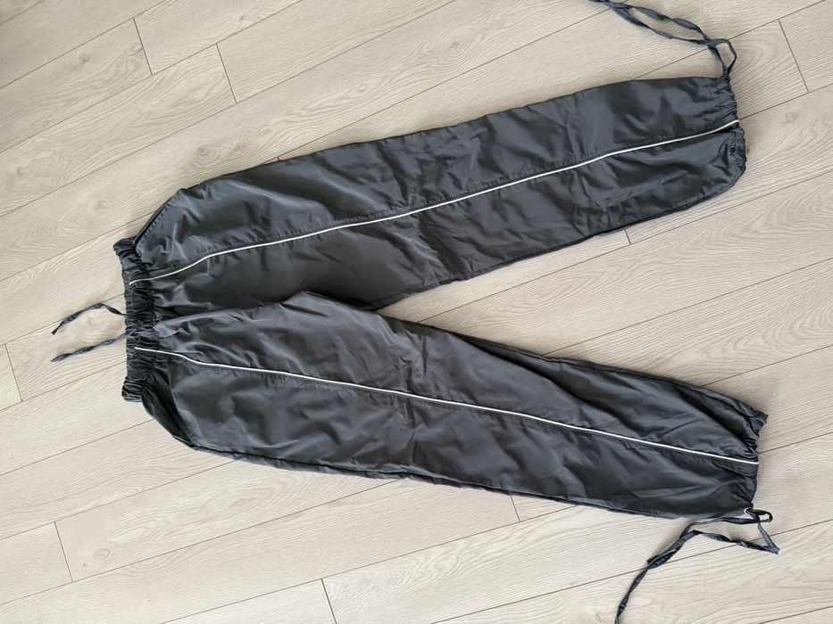 Штани з плащівки