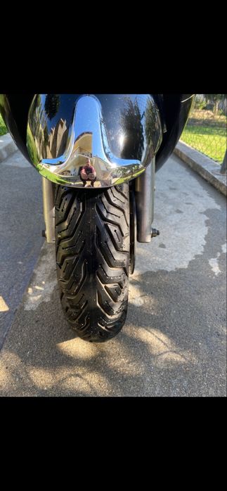 Vedo moto 125 como nova e bem estimada