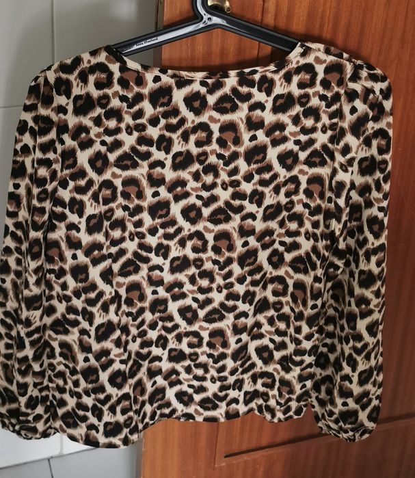 Blusa tigresa de manga comprida