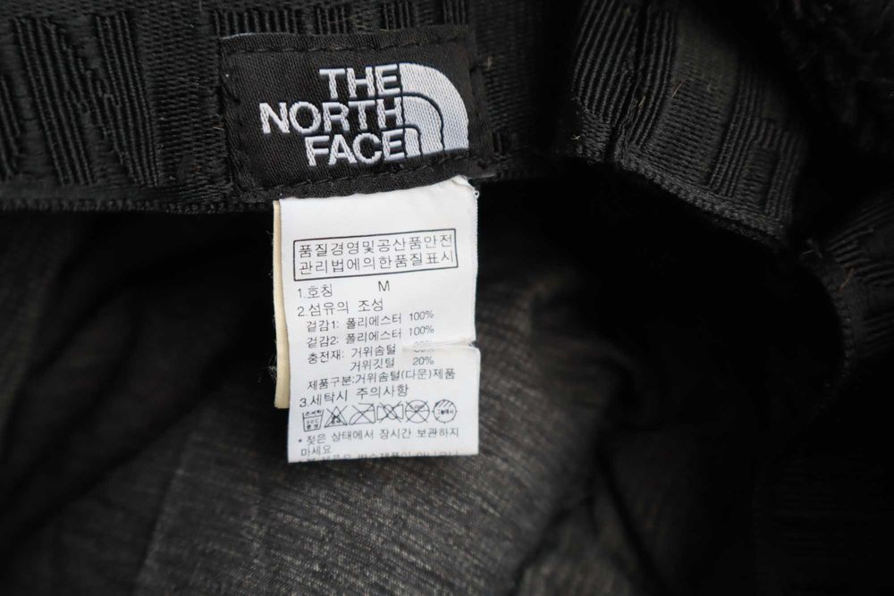 The North Face пухова шапка ушанка