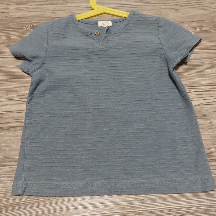 Śliczna koszulka marki Newbie w rozmiarze 98/104.