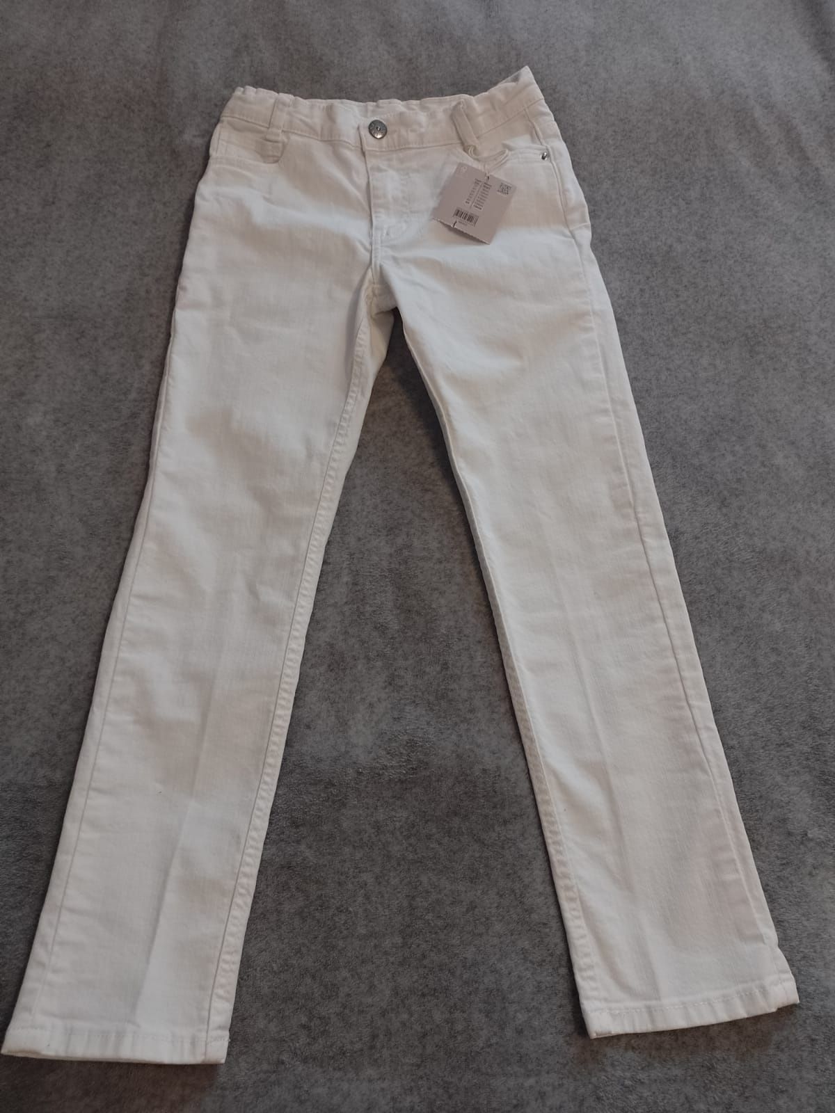 Nowe białe jeansy dla dziewczynki, rozm 134