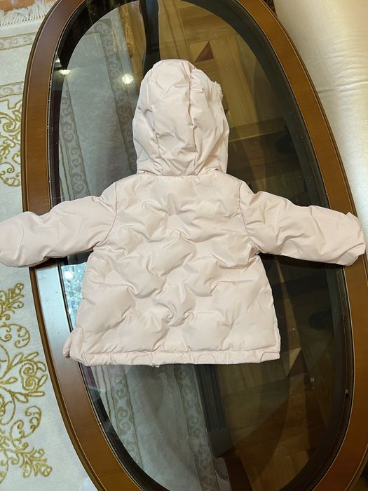 Дитя теплі куртки.