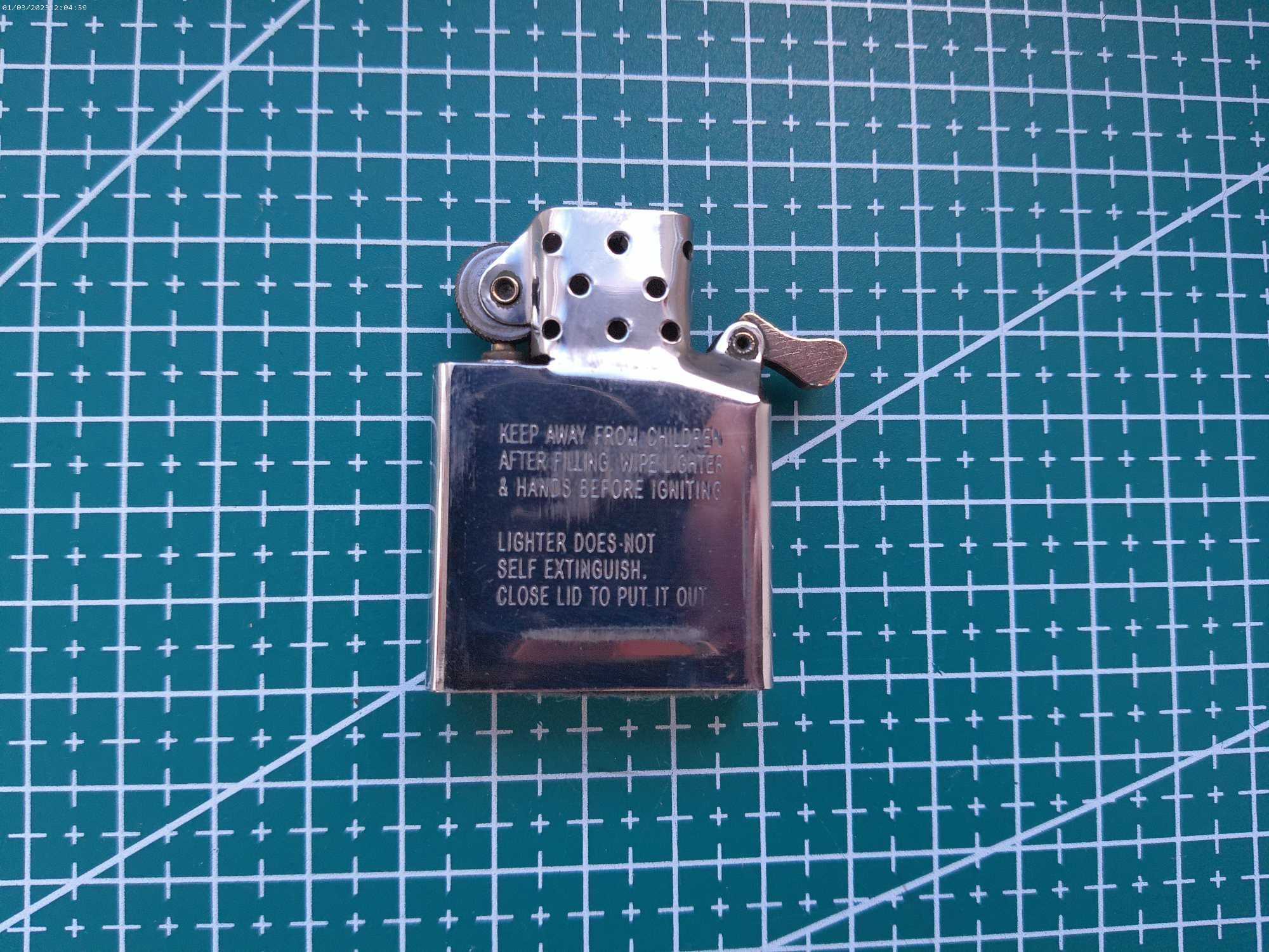 Зажигалка ZIPPO.