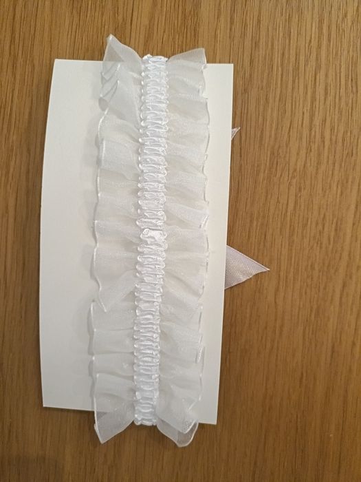 Liga de noiva com laço rosa velho