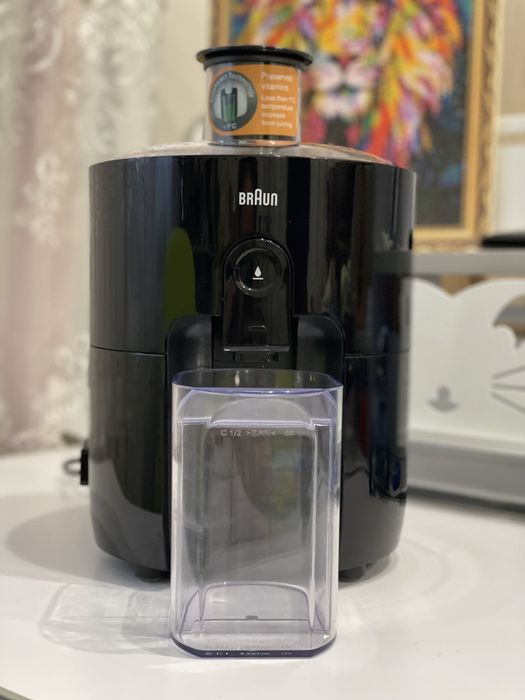 Соковитискач Braun / Соковыжималка Braun JC 301 AI