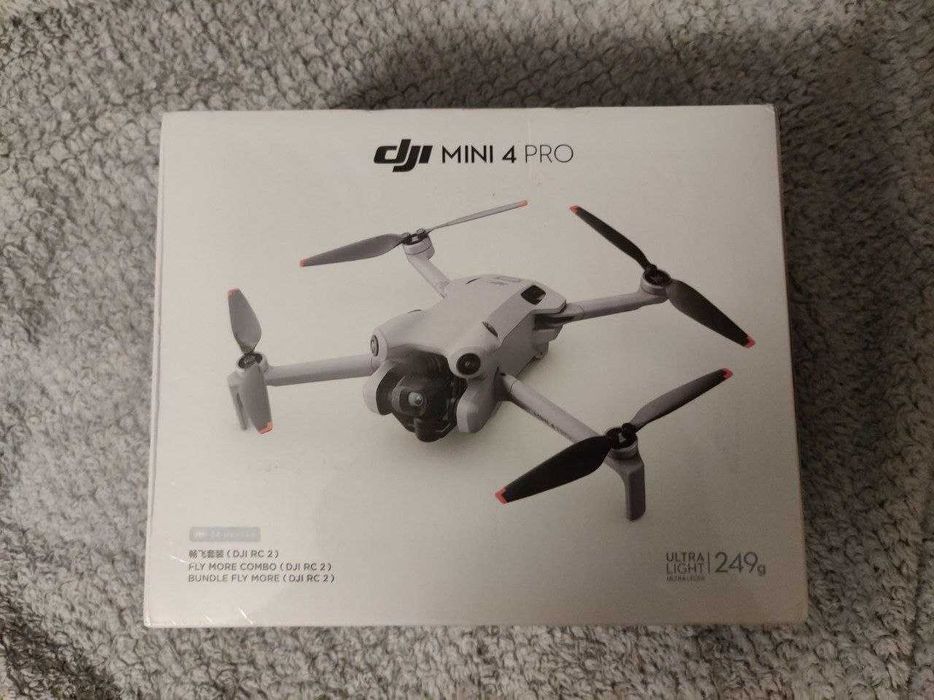 NOWY DJI Mini 4 Pro Fly More Combo z RC2 – fabrycznie zapakowany