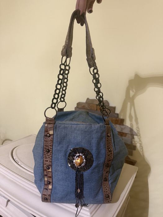 Ковбойські джинсові чобітки з шкіряними вставками та сумка