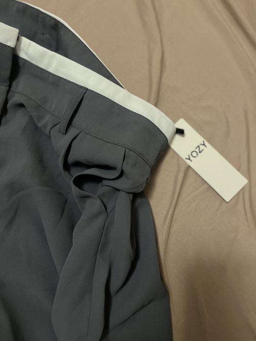 Стильные брюки палаццо