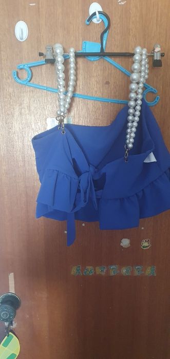 Conjunto calças e tope