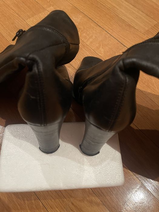 Botas em pela sintetica