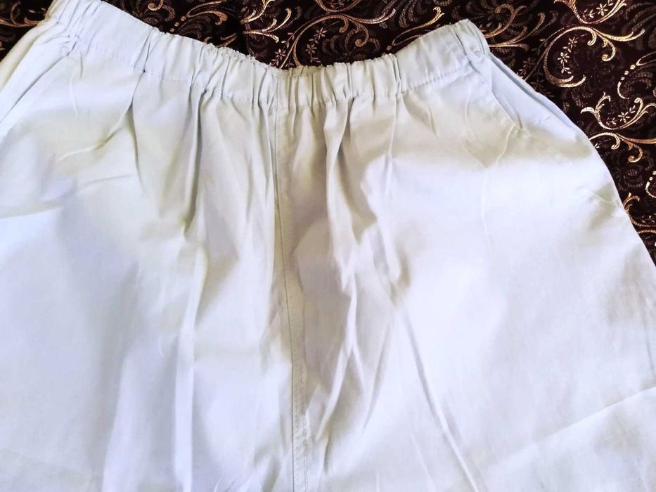 Spodnie damskie rybaczki bladoniebieskie rozm. 50