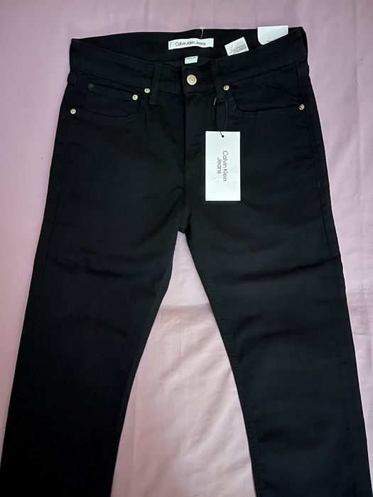 Wyprzedaż spodnie męskie Calvin Klein Jeans.