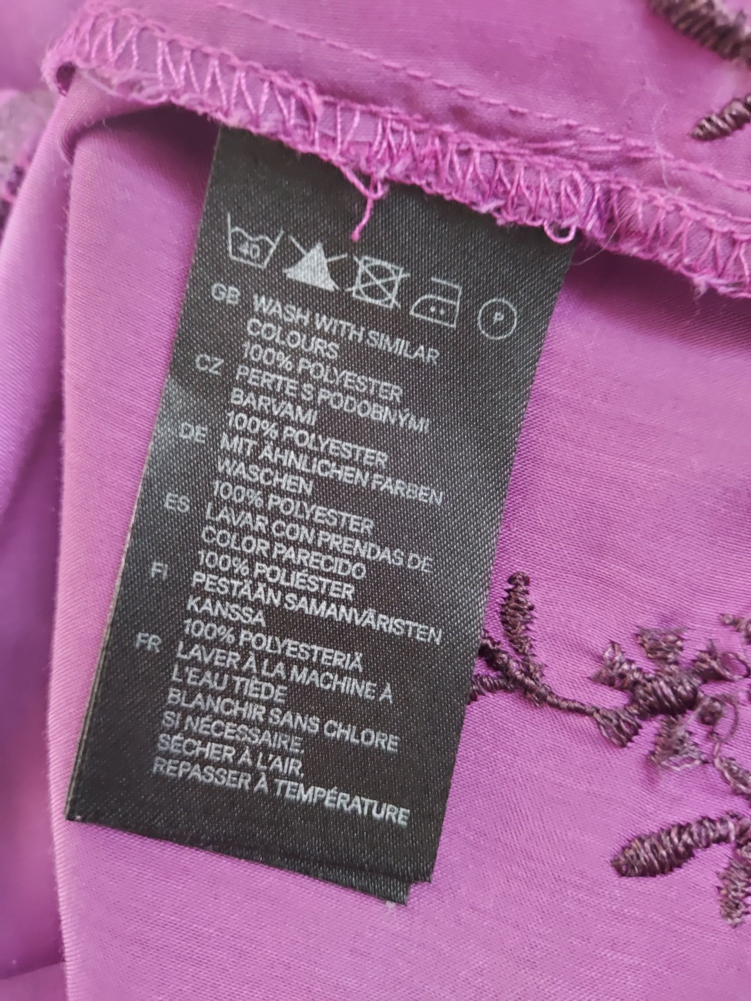 Fioletowa bluzka tunika z czarnym haftem odcinana pod biustem H&M 44