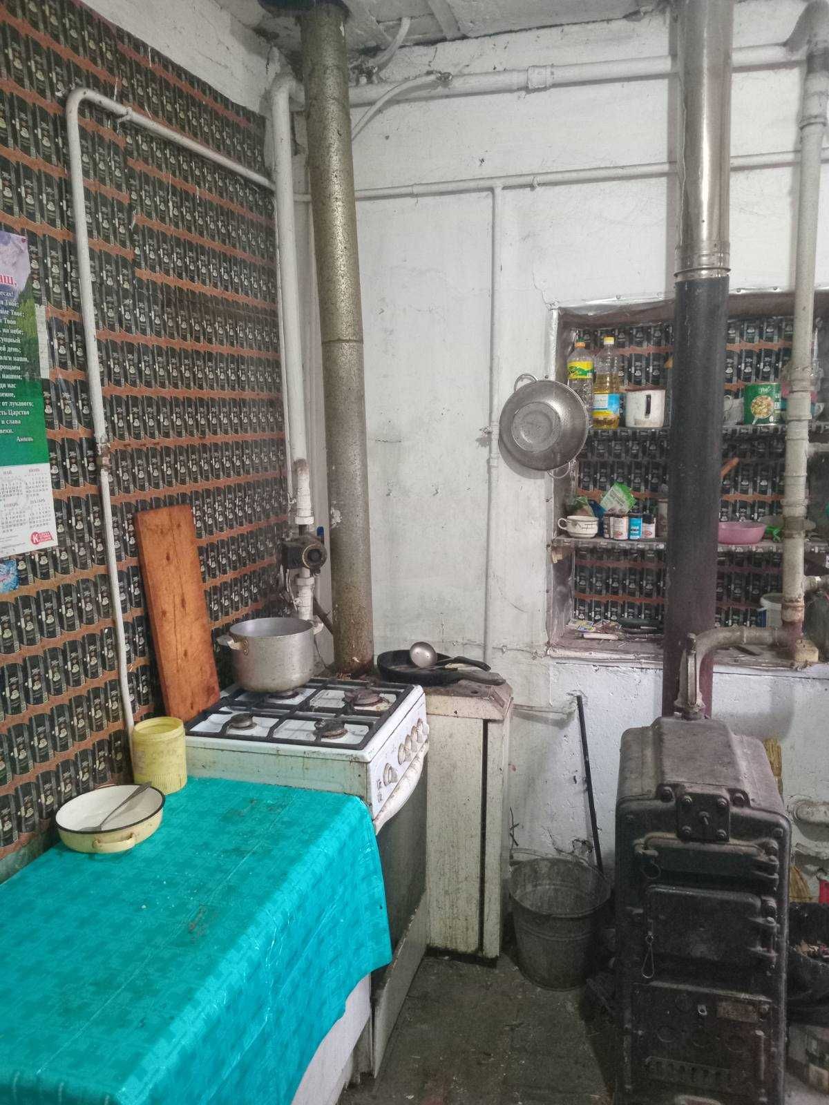 Продам часть дома в Люботине (центр Водяне) с удобствами