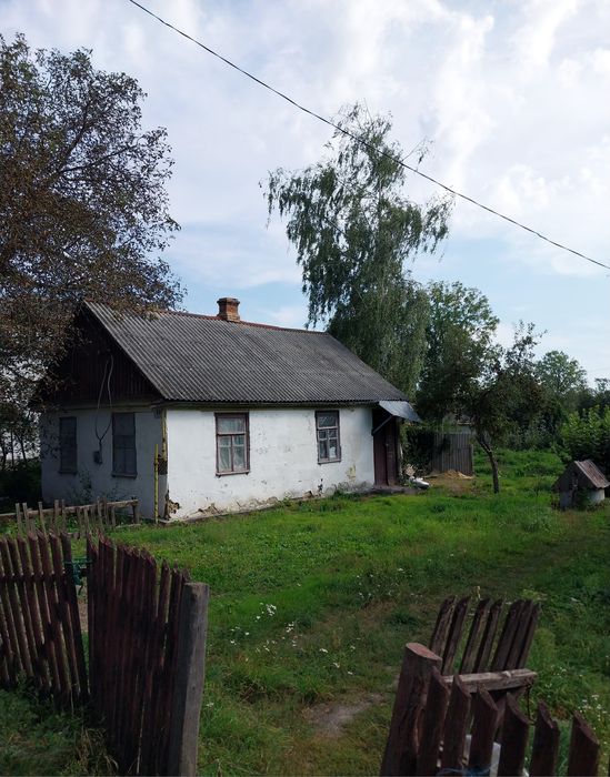 Будинок- земельна ділянка