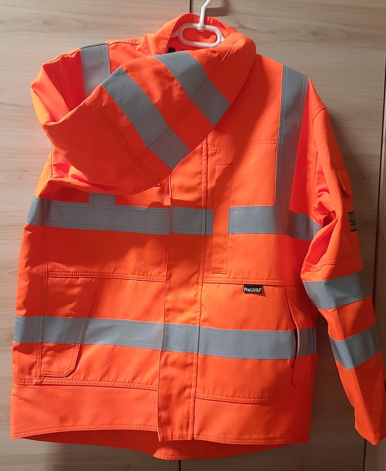 r. Xl Pomarańczowa ,odbladkowa kurtka robocza