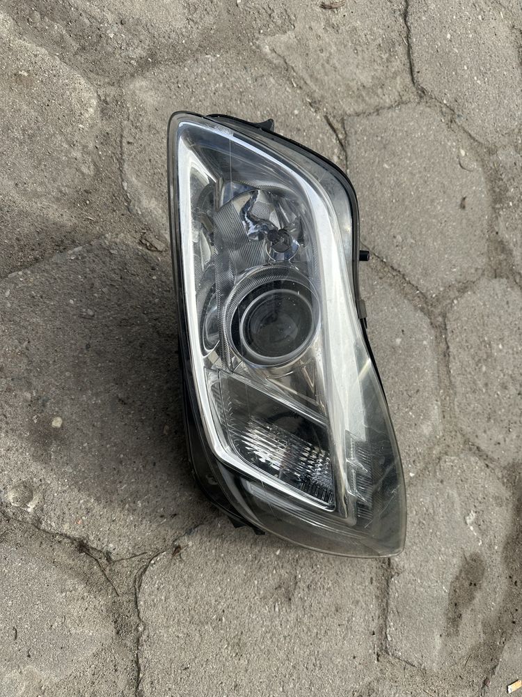 Opel insignia A lampa bixenon lewy przòd całe szkło soczewka europa