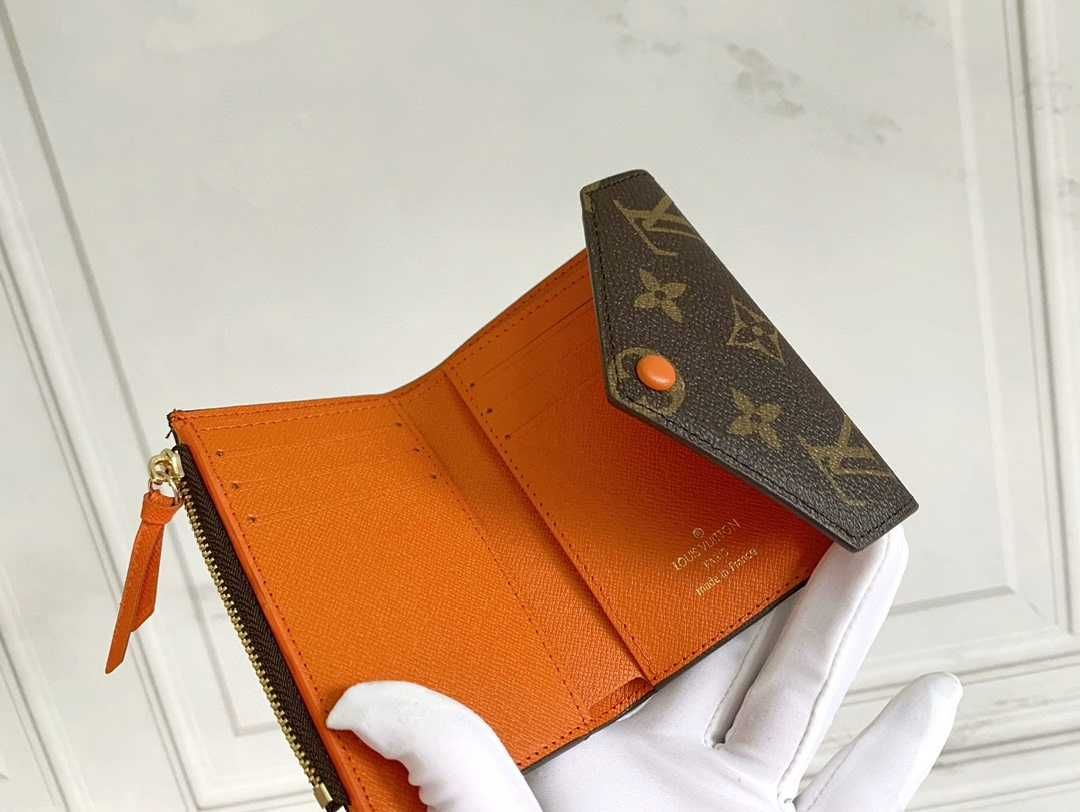 Nowe Louis Vuitton Victorine Mały portfel Pomarańczowy przycisk
