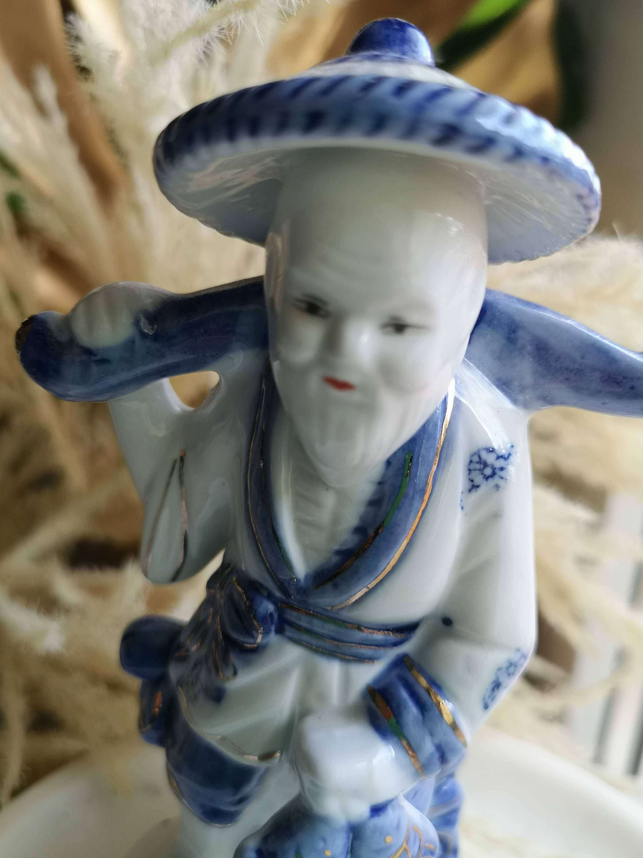 figurka porcelanowa rybak