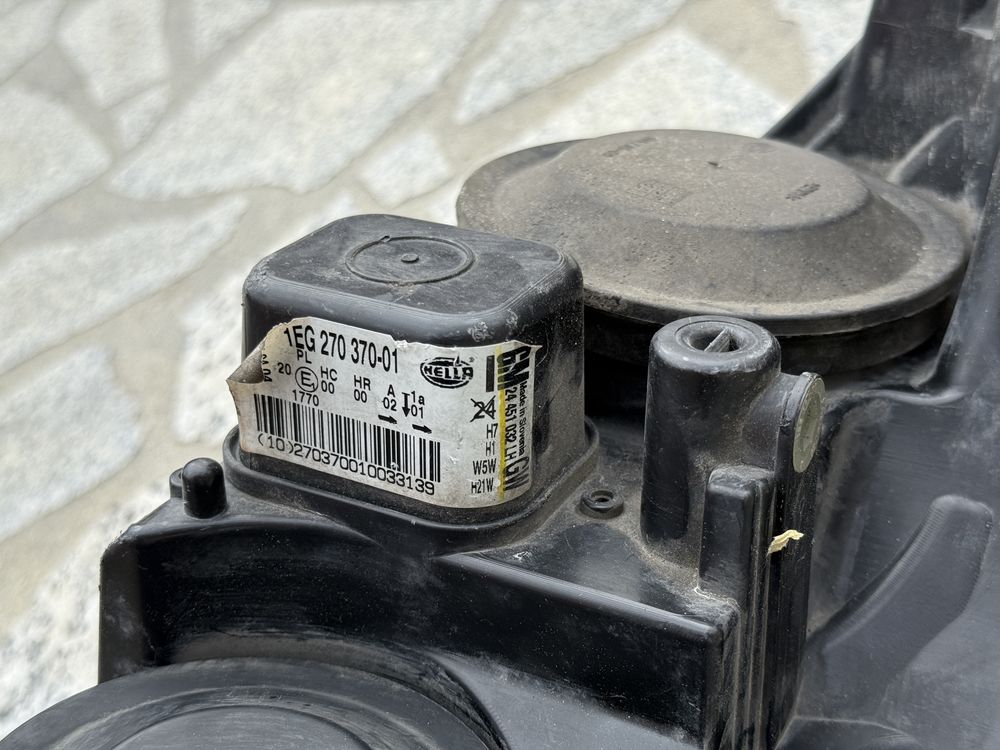 Farol esquerdo Opel Astra H