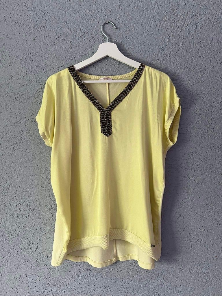 Żółta bluzka firmy Megi rozmiar L/XL
