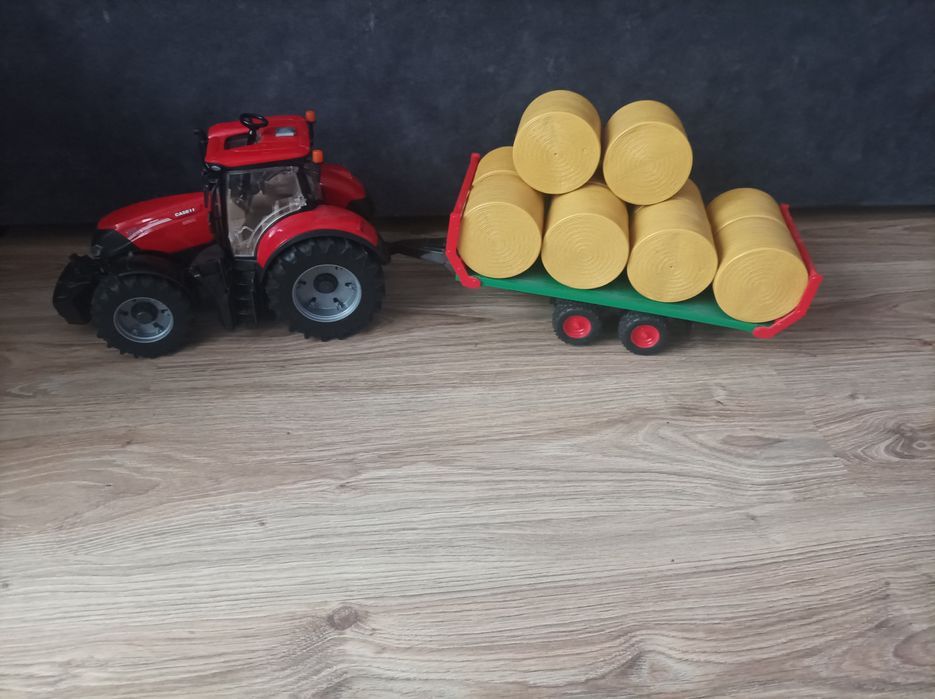 Traktor bruder case z przyczepą do balotów odbiór osobisty