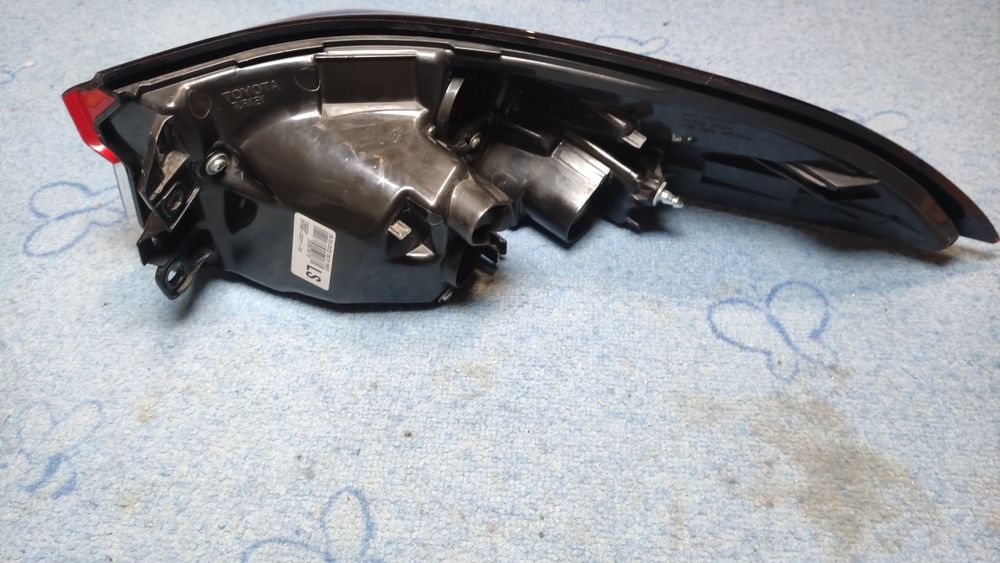 Lampa tylna lewa Toyota Corolla E21 18-23