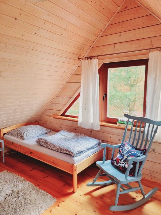 Domek nad jeziorem z linią brzegową na Mazurach Ryn Rybical - Staś