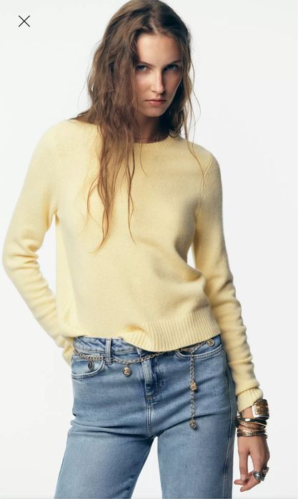 Шерстяний светр жовтий з круглим вірозом