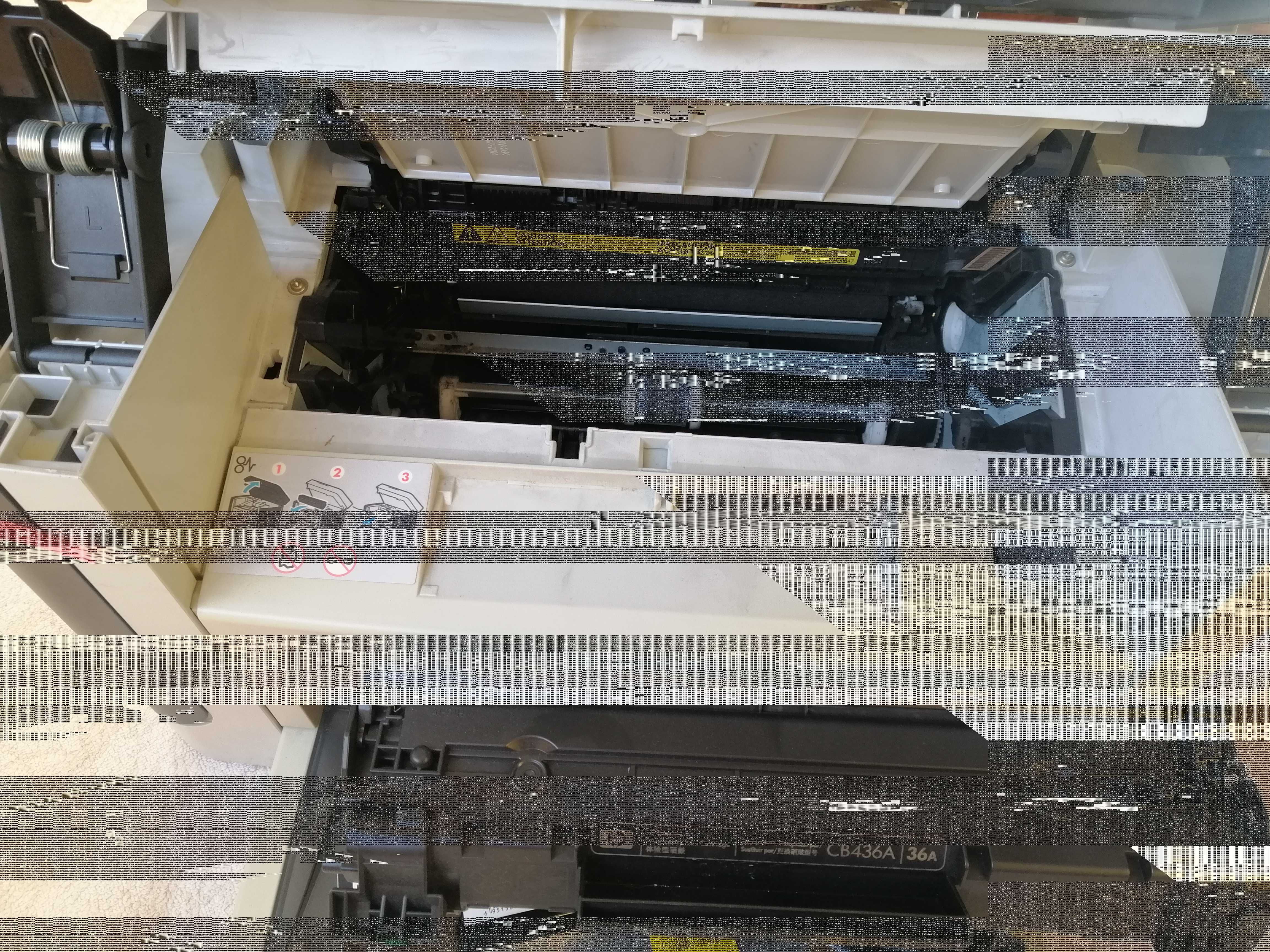 Лазерный МФУ HP LaserJet M1120n MFP