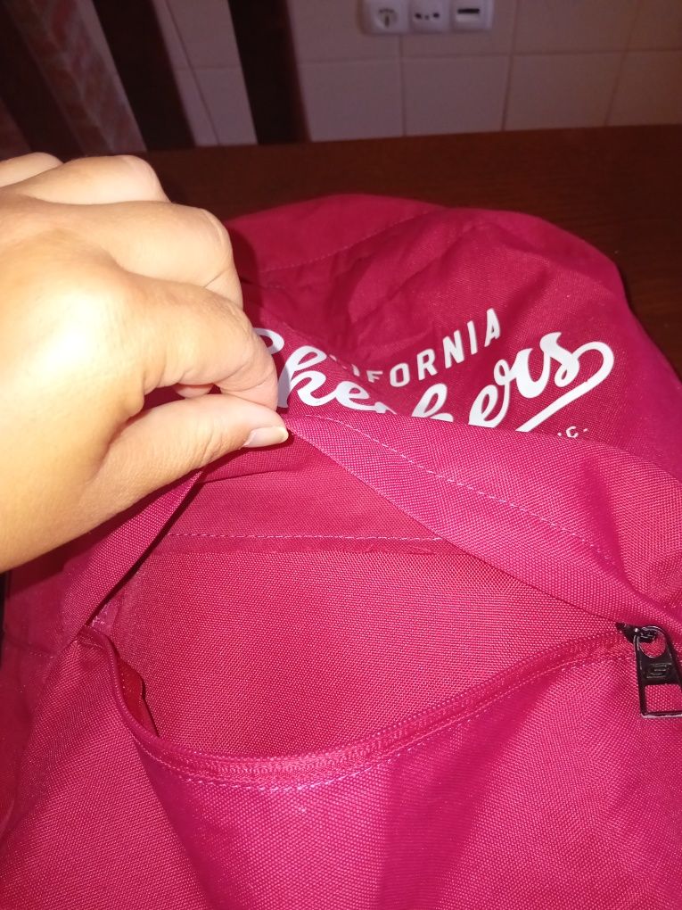 Mochila Skechers ótimo estado