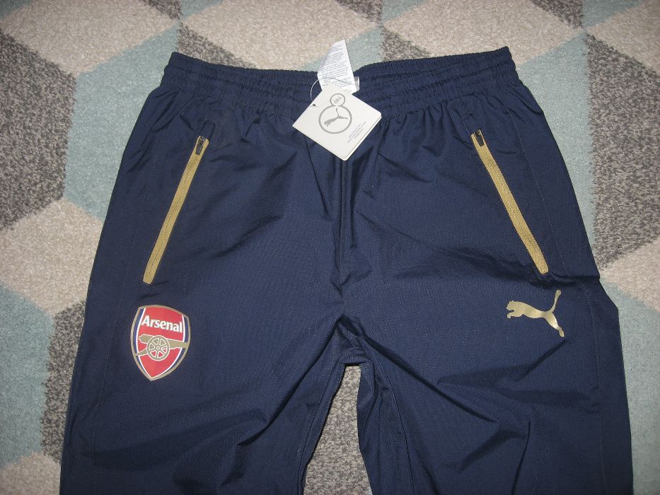 PUMA Arsenal Nowe spodnie dla piłkarza przeciwdeszczowe S OKAZJA