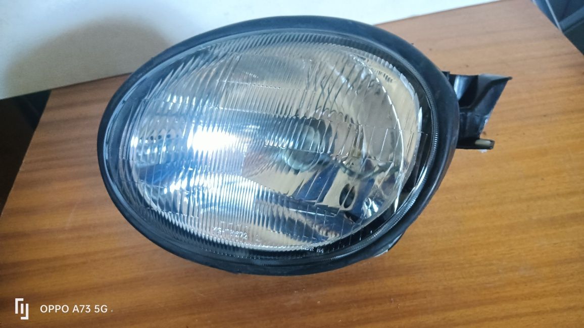 Farol Toyota Corolla ótica 1998 esquerda