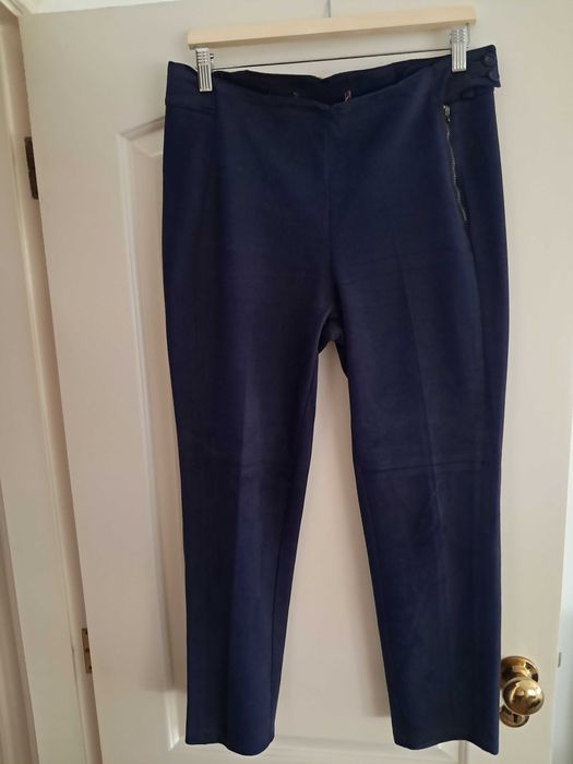 Calças pele pêssego azul quase novas