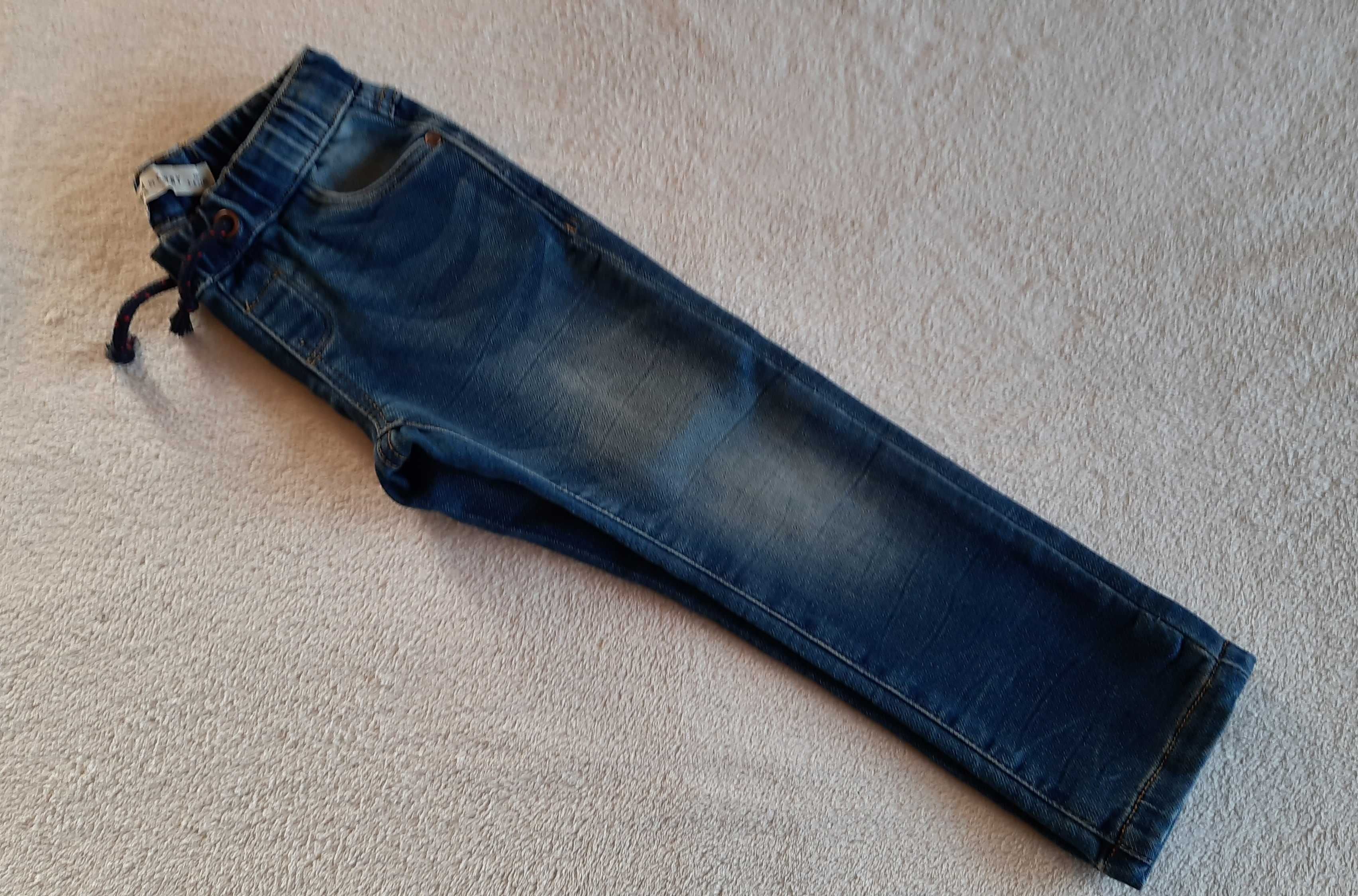 Spodnie jeansy Carry rozm.104